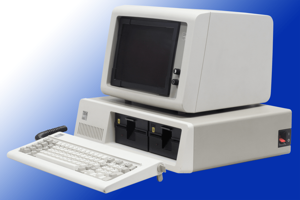 IBM PC 5150 on blue/white gradient background